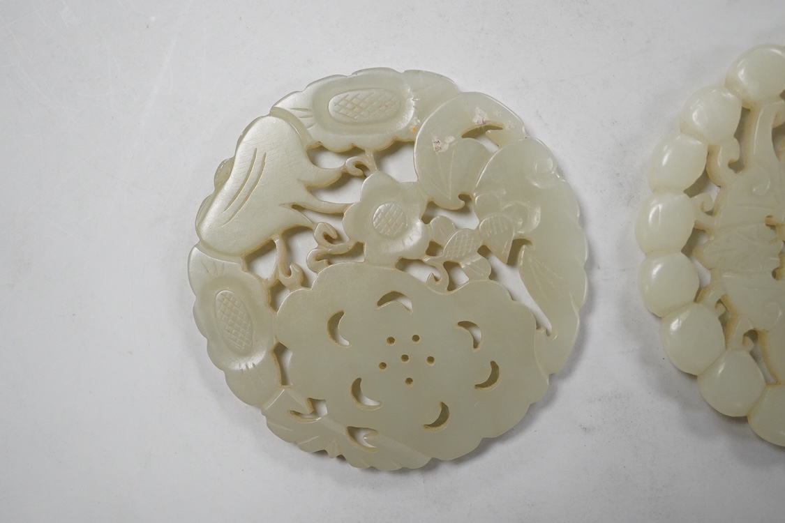 Two Chinese celadon jade circular plaques, 19th century, 5.5cm diameter